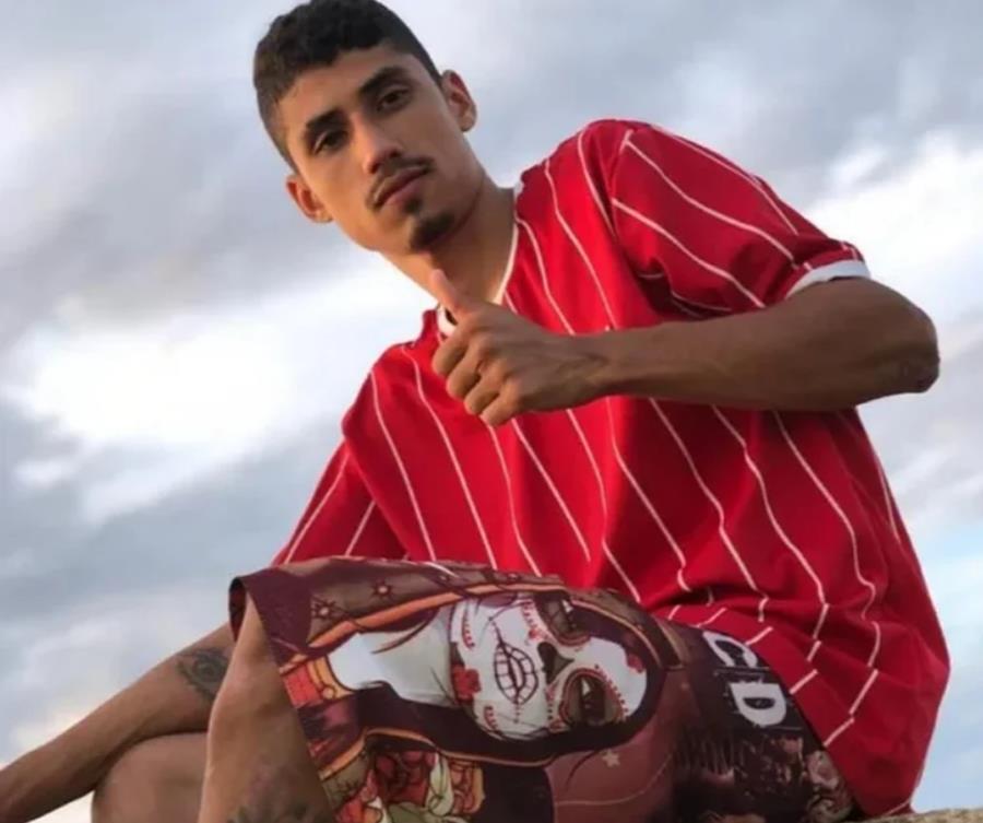 JOVEM MORTO E PALMAS